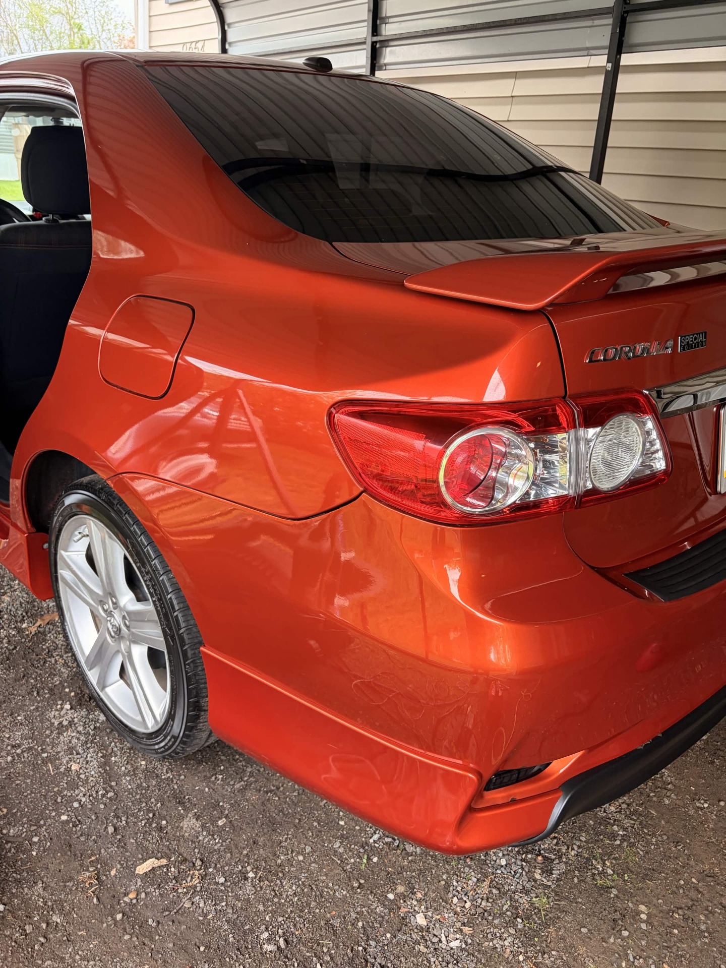 Glossy paint finish on detailed Corolla rear
